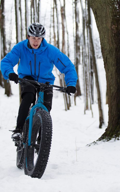 Fat biker riding in the snow