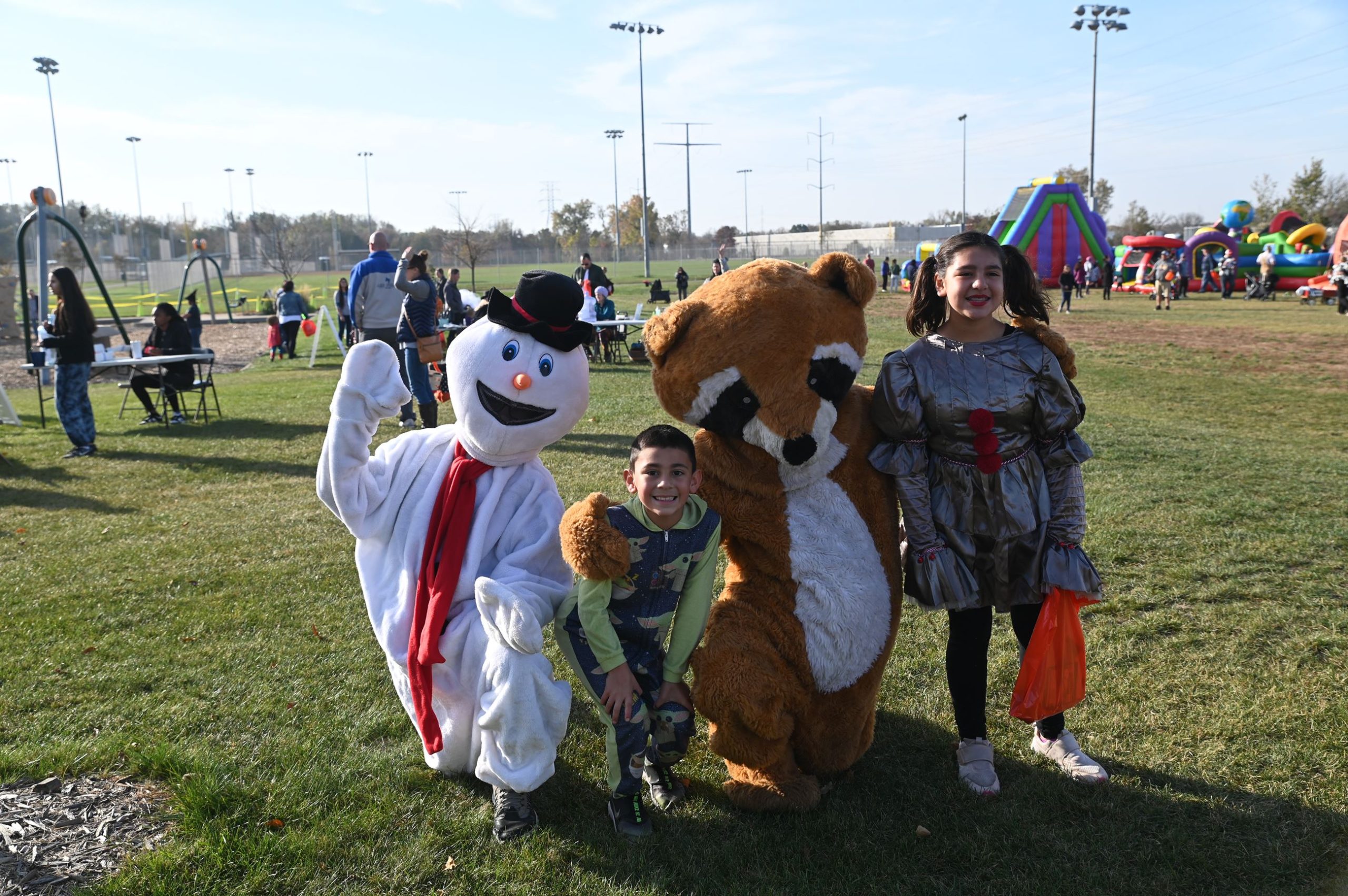 Children attending the Coon Rapids Rocky's Pumpkin Patch Event with Frosty and Rudolph