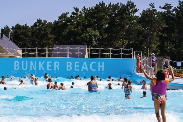 kids playing at the wave pool