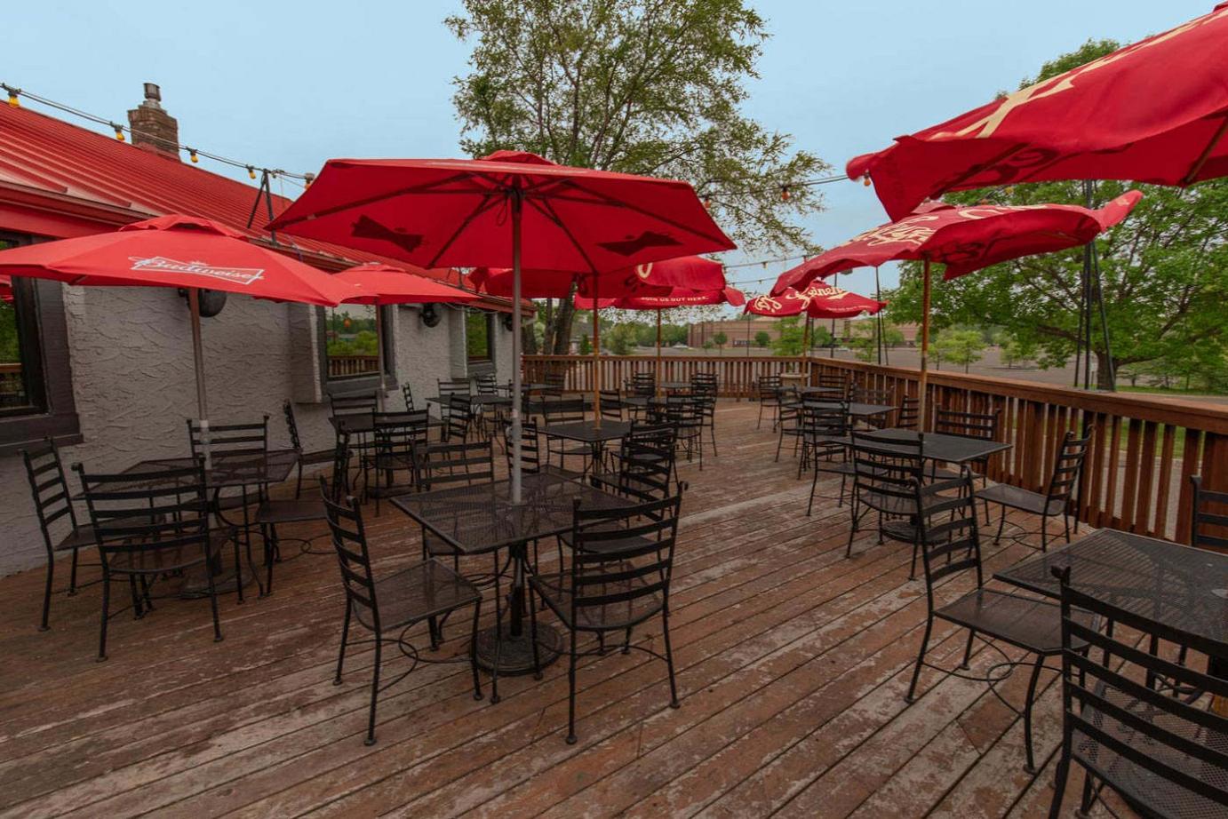 Patio Dining with tables and umbrellas